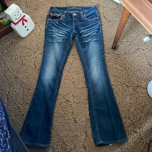 The back of the pant leg are a little worn. Other than that perfect condition.